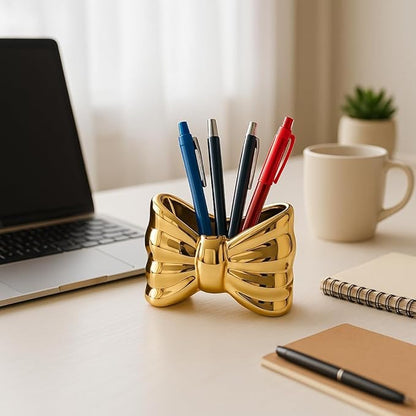 Bow shaped makeup brush holder